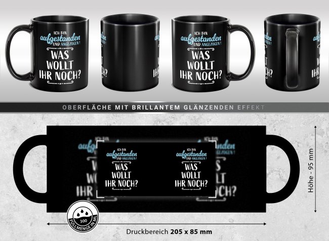 Schwarze Tasse mit Spruch - Aufgestanden und angezogen - Was wollt ihr noch?